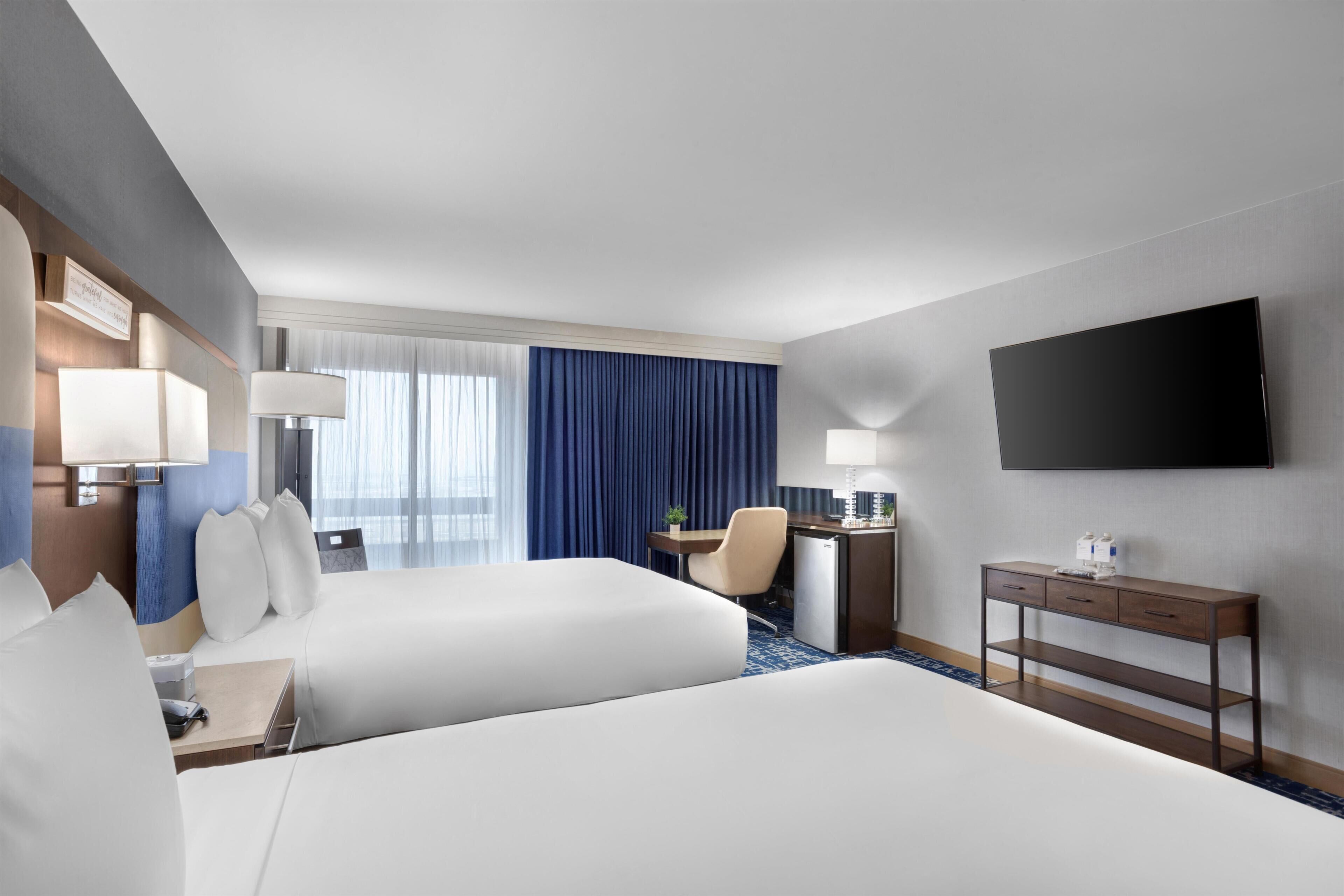 Habitación, 2 camas de matrimonio | Ropa de cama de alta calidad y colchones con acolchado adicional