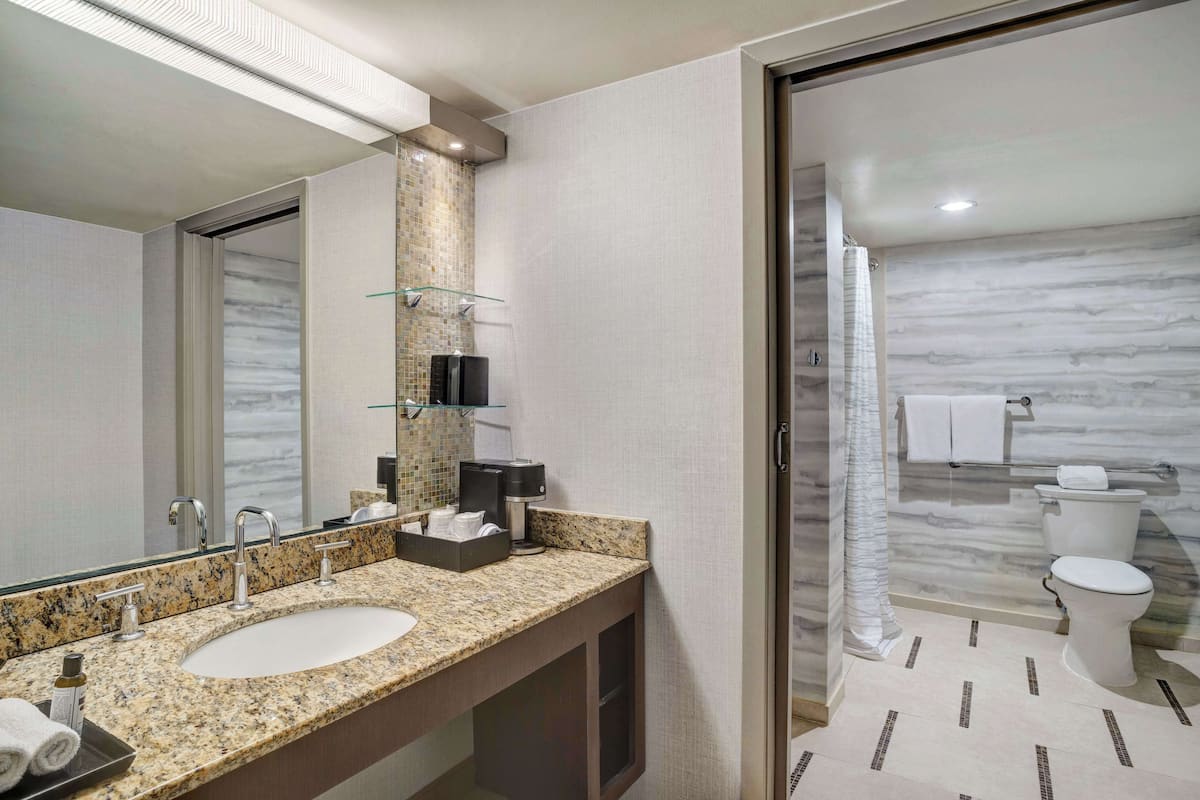 premium bedding, pillow-top beds, desk, laptop workspace