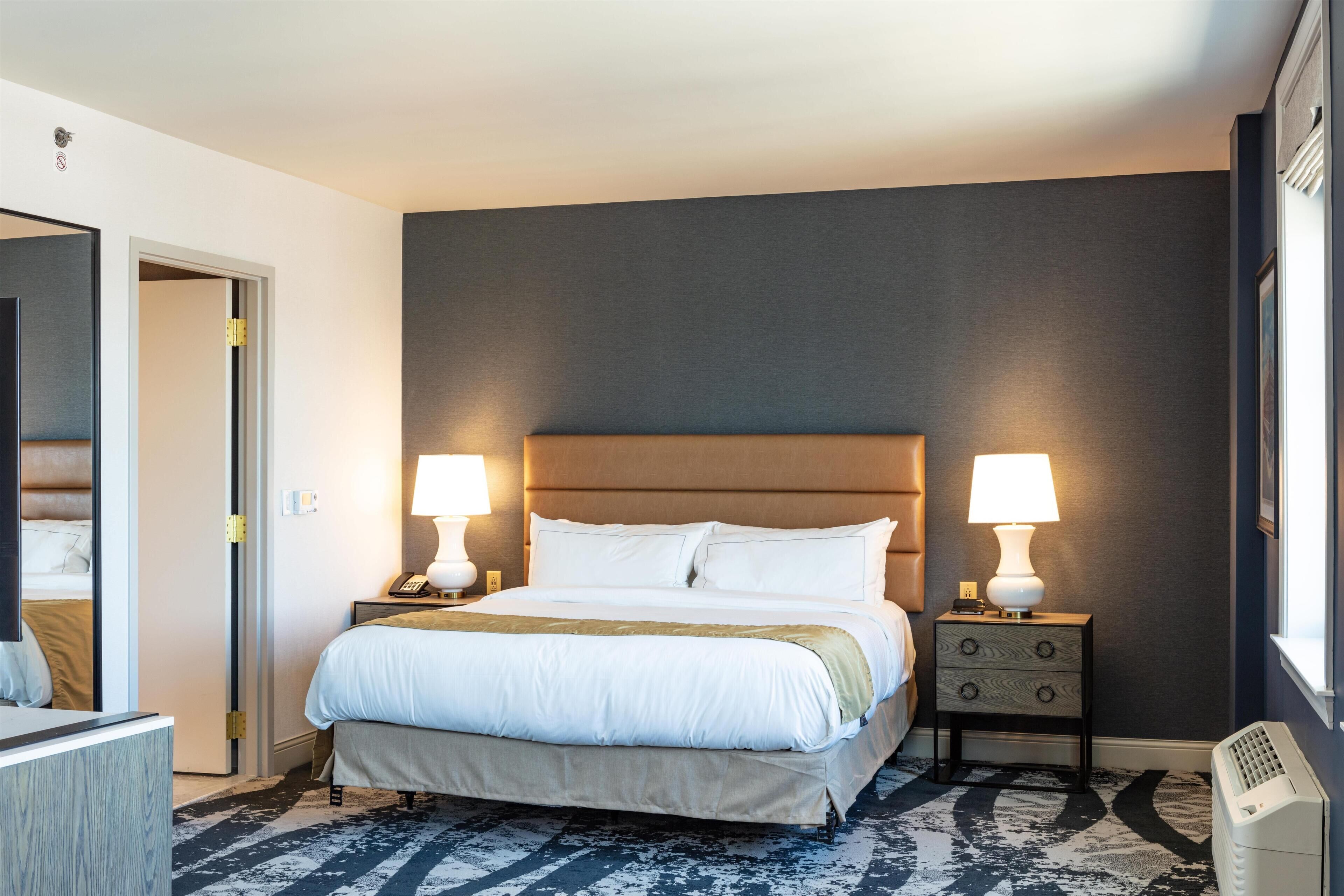 Down duvets, pillow-top beds, in-room safe, desk