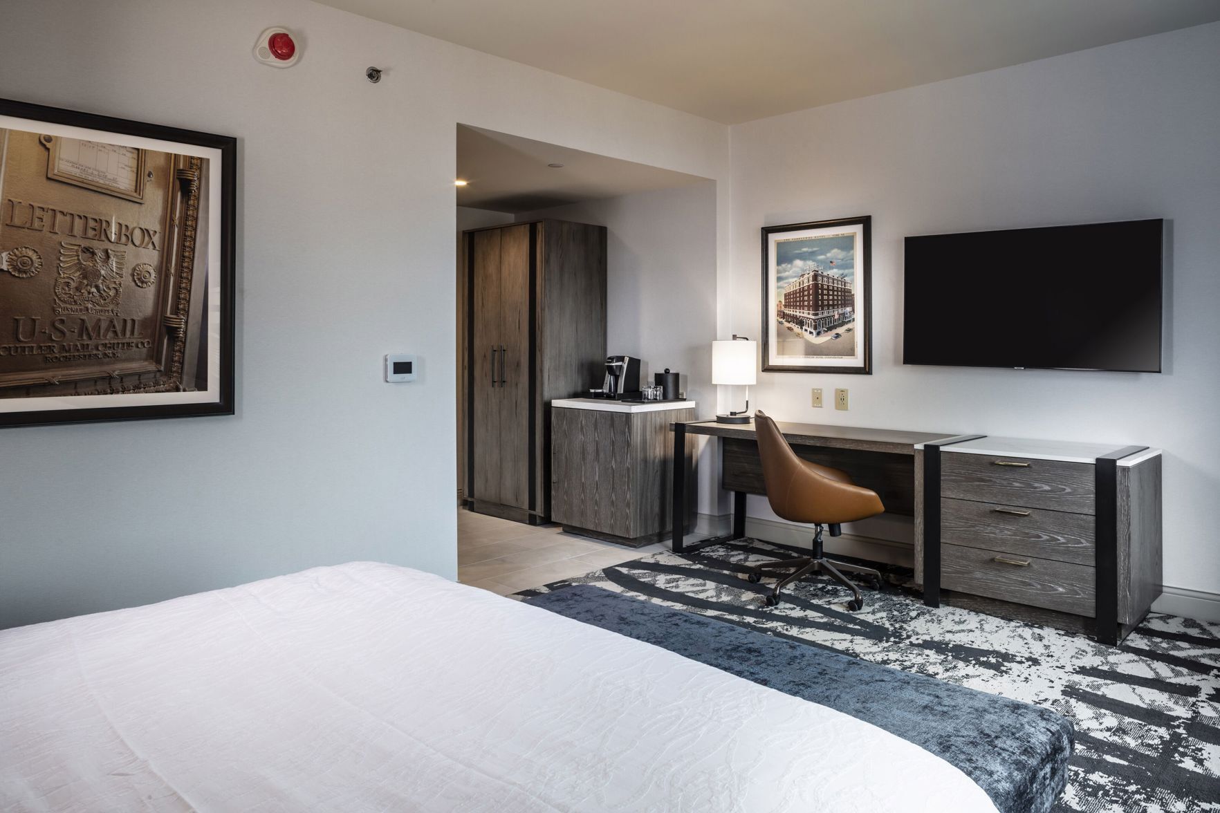 Down comforters, pillowtop beds, in-room safe, desk
