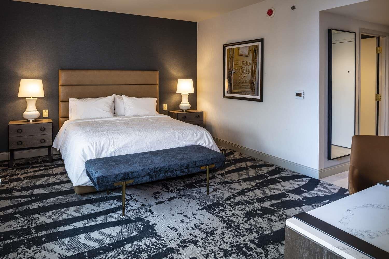 Down duvets, pillow-top beds, in-room safe, desk