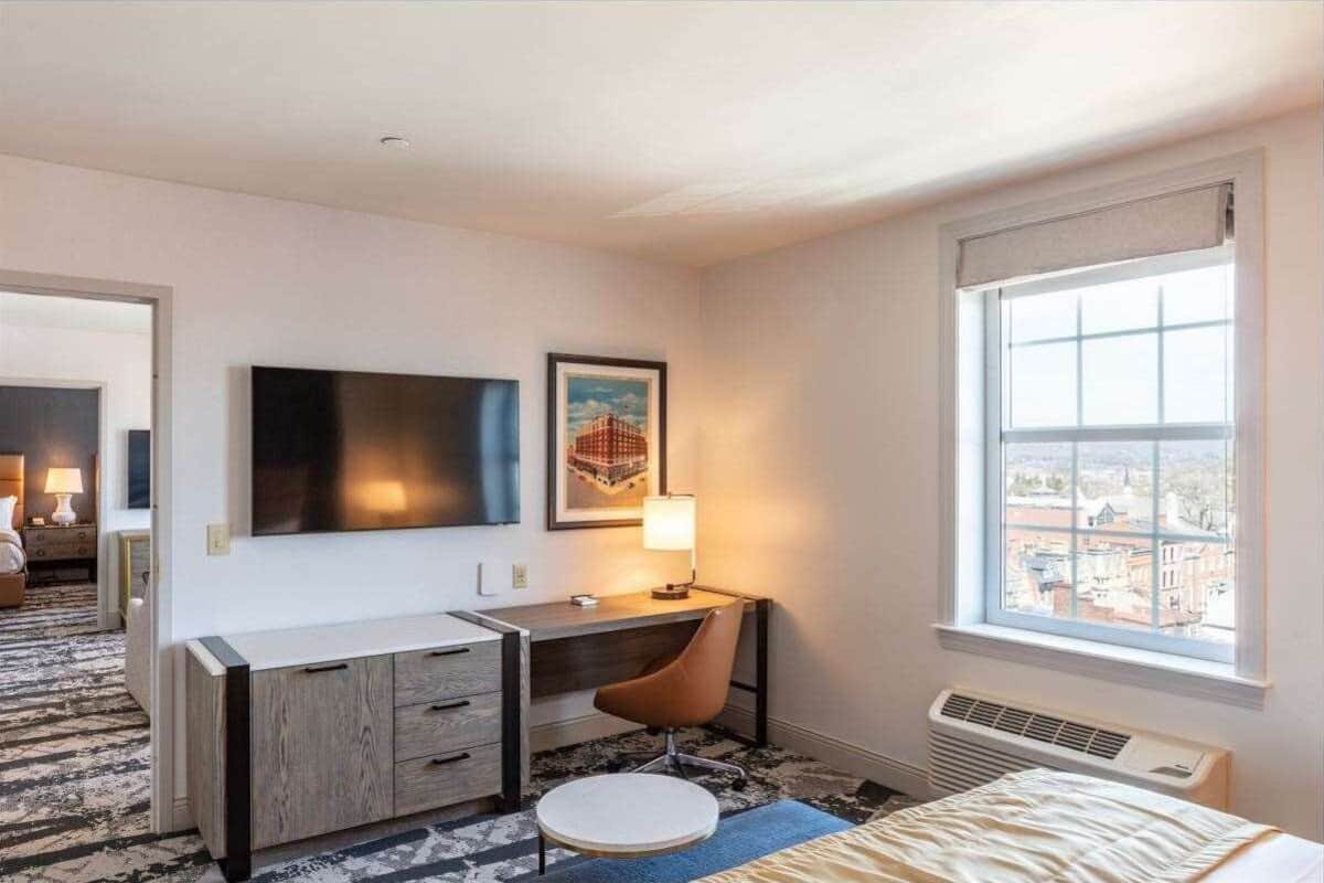 Down comforters, pillowtop beds, in-room safe, desk
