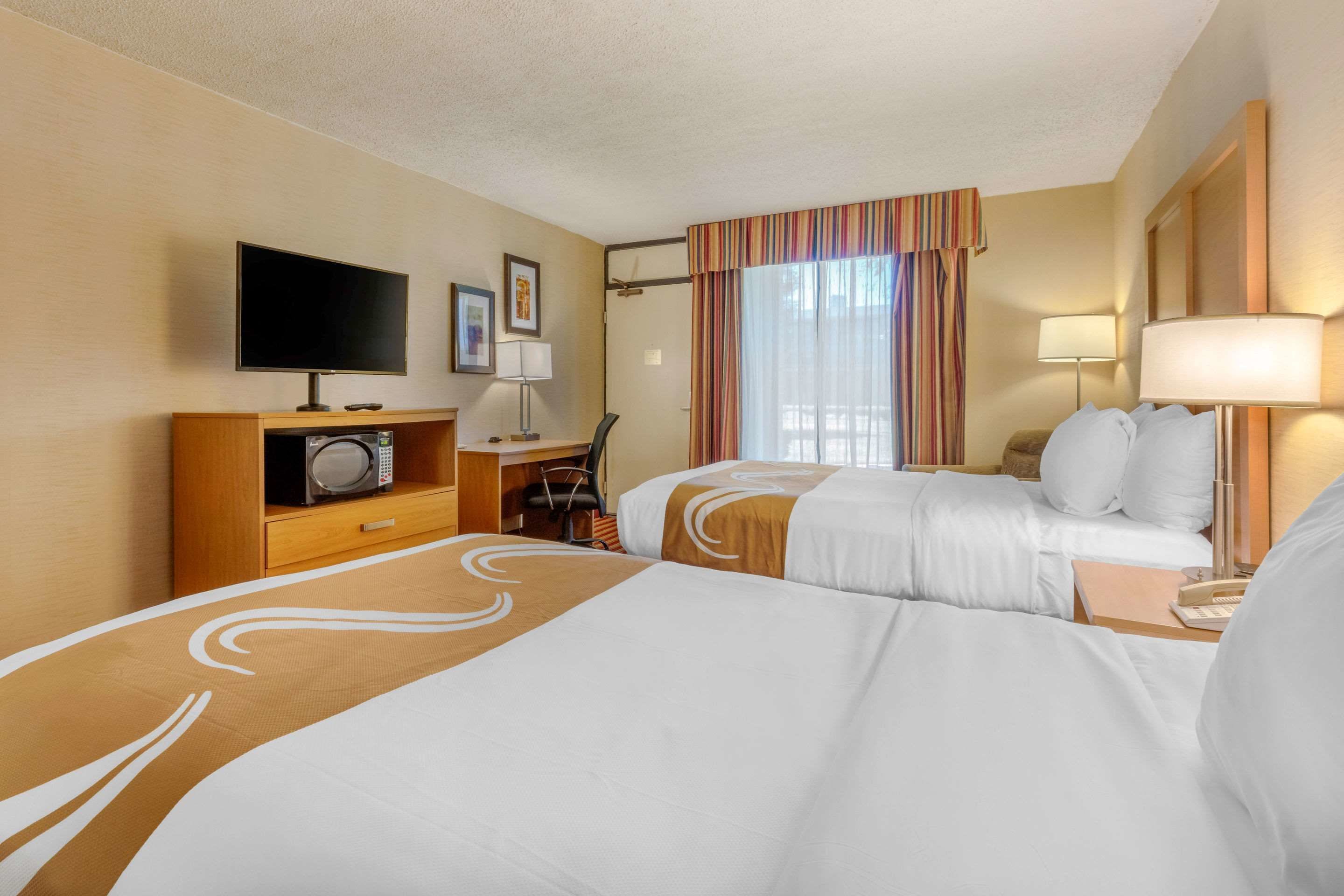 premium bedding, individually furnished, desk, blackout curtains