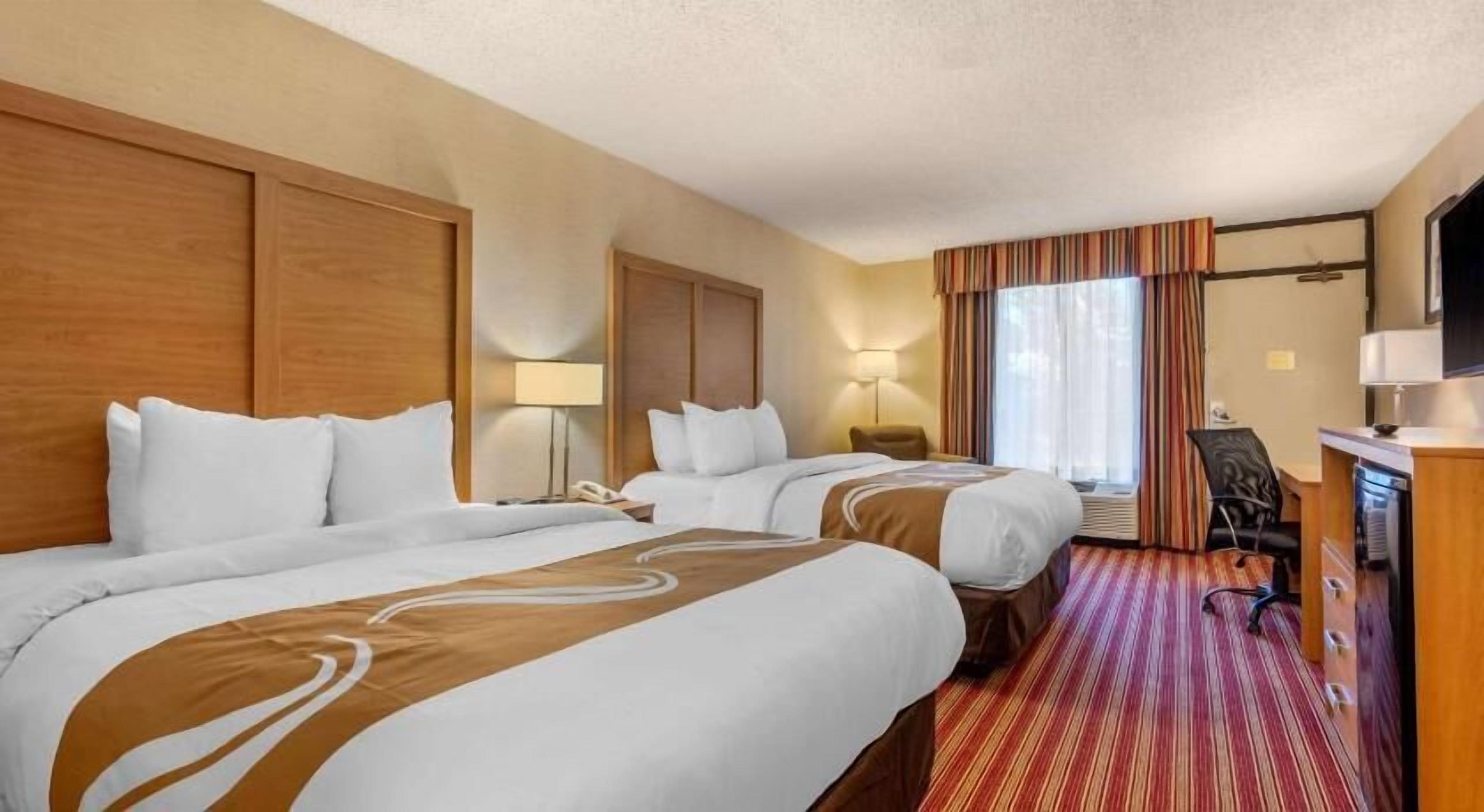 Premium bedding, individually furnished, desk, blackout drapes