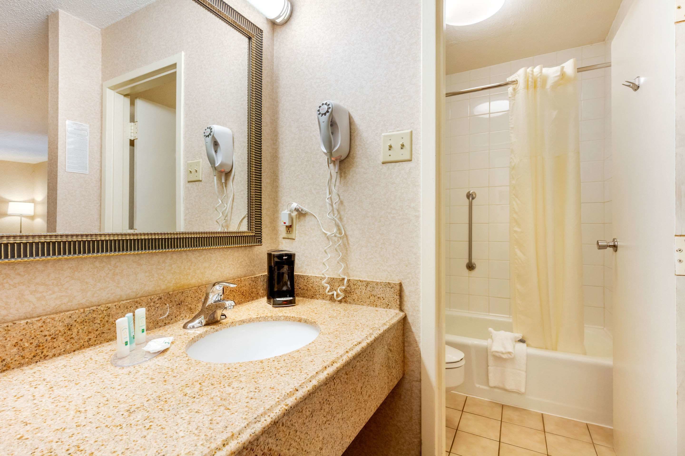 combined shower/bathtub, free toiletries, hair dryer, towels