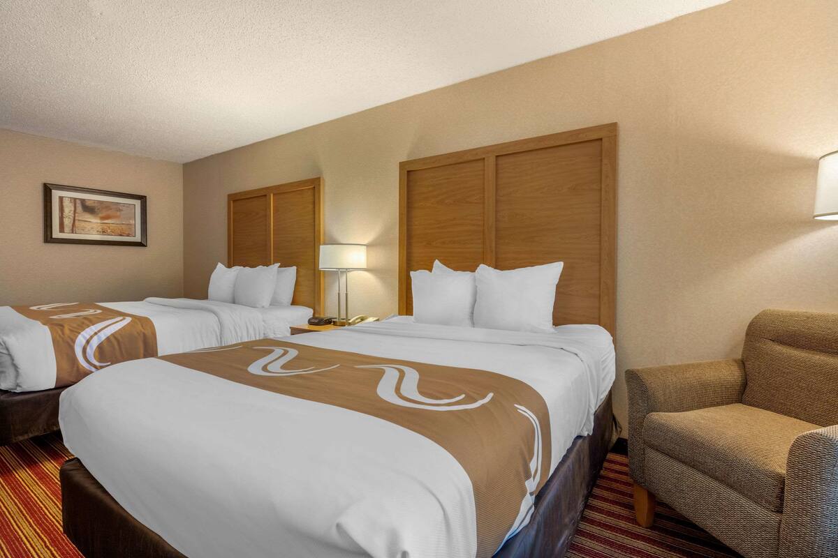 Premium bedding, desk, blackout curtains, soundproofing