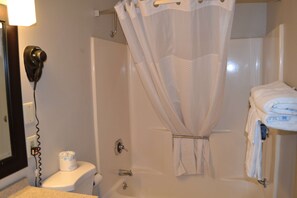 Bathtub, free toiletries, hair dryer, towels