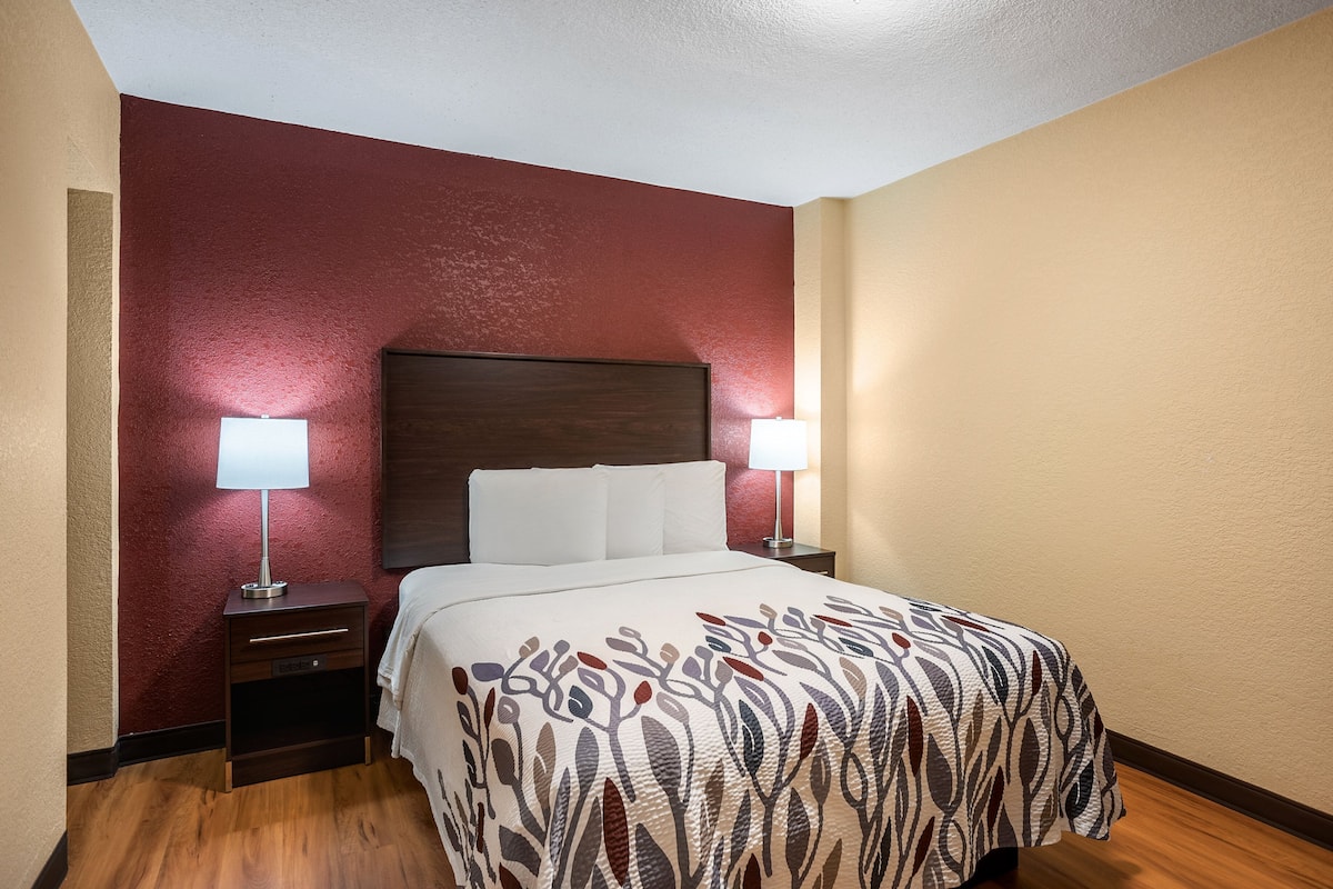 Desk, iron/ironing board, cribs (free), WiFi (free)