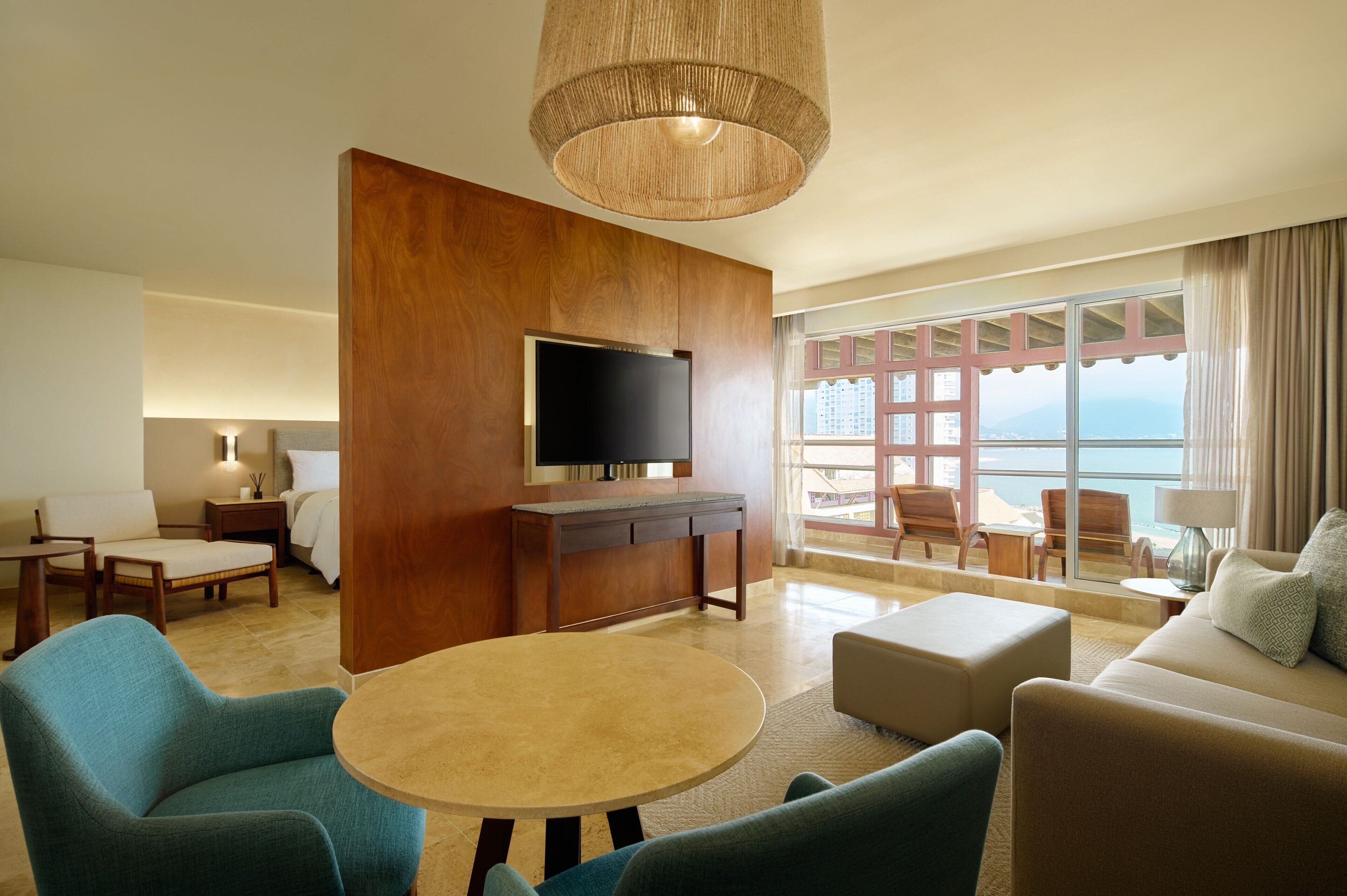 panoramic suite, 1 king bed with sofa bed, non smoking, ocean view | 1 bedroom, minibar, in-room safe, desk