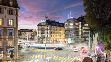 A city intersection with buildings, including a hotel with a sign that reads "Central."