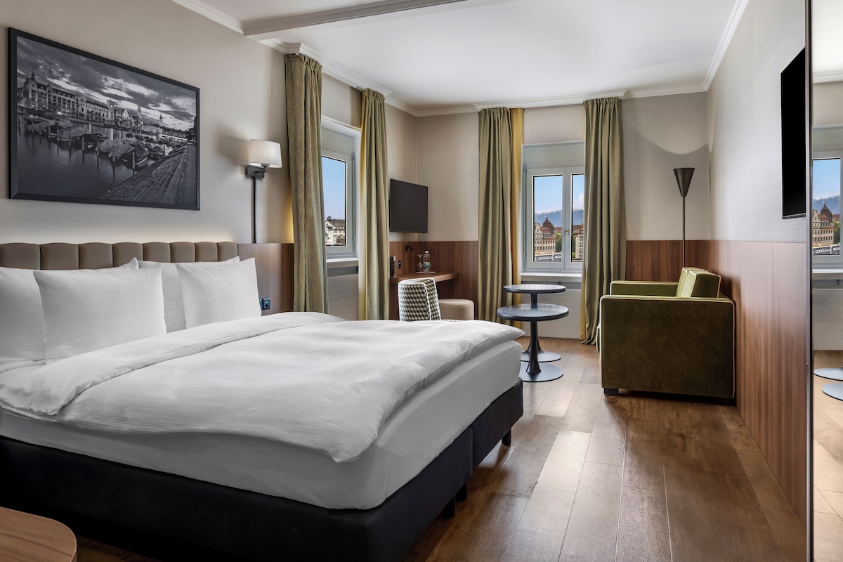 Junior Double Room, City View | Hypo-allergenic bedding available, down comforters, in-room safe