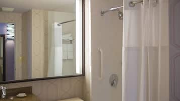 Combined shower/tub, designer toiletries, hair dryer, towels