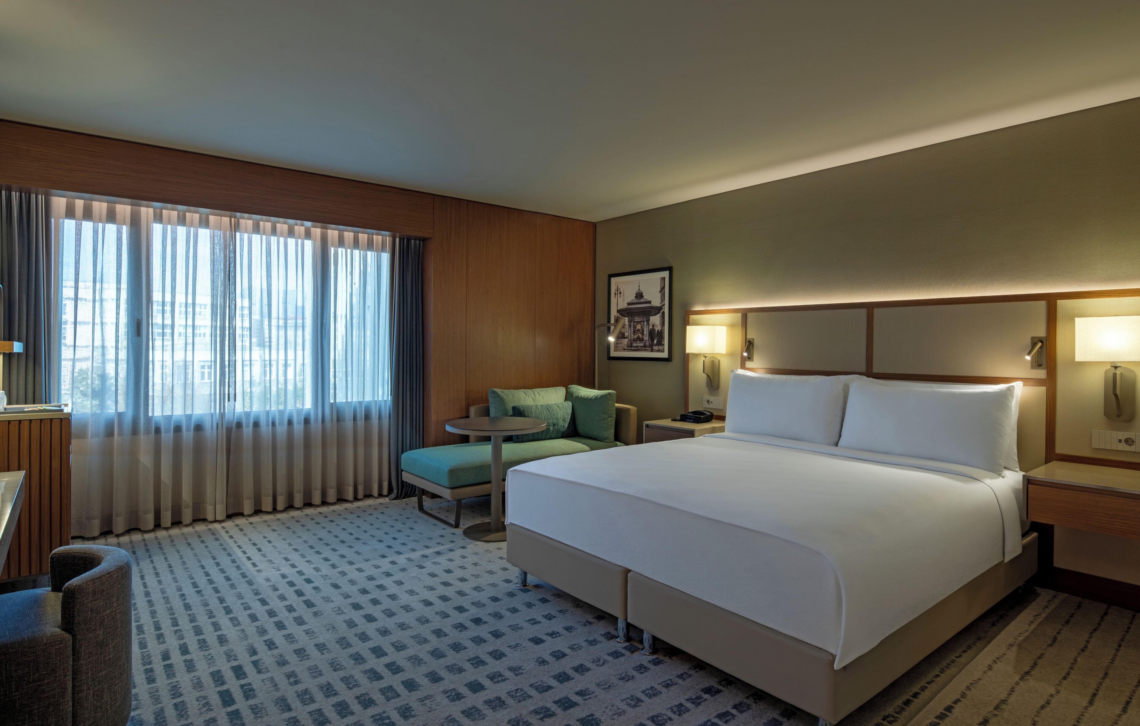 Room, 1 King Bed (Guest) | Minibar, in-room safe, desk, iron/ironing board