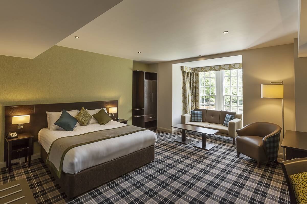 superior room, 1 king bed, non smoking | premium bedding, in-room safe, individually decorated