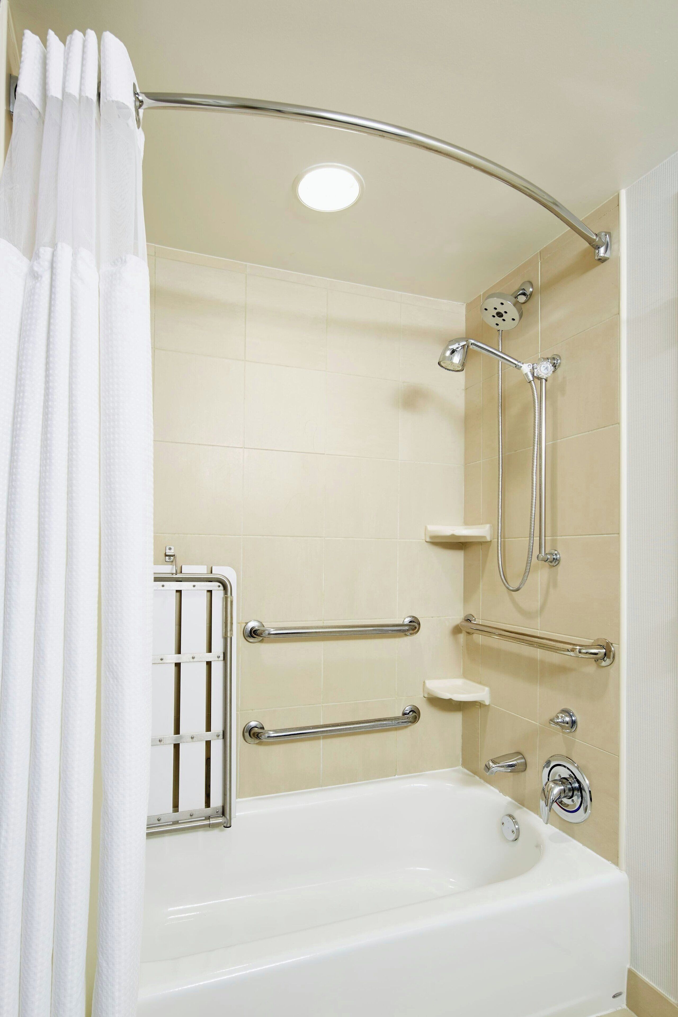 room, 1 king bed | bathroom | combined shower/bathtub, free toiletries, hair dryer, towels