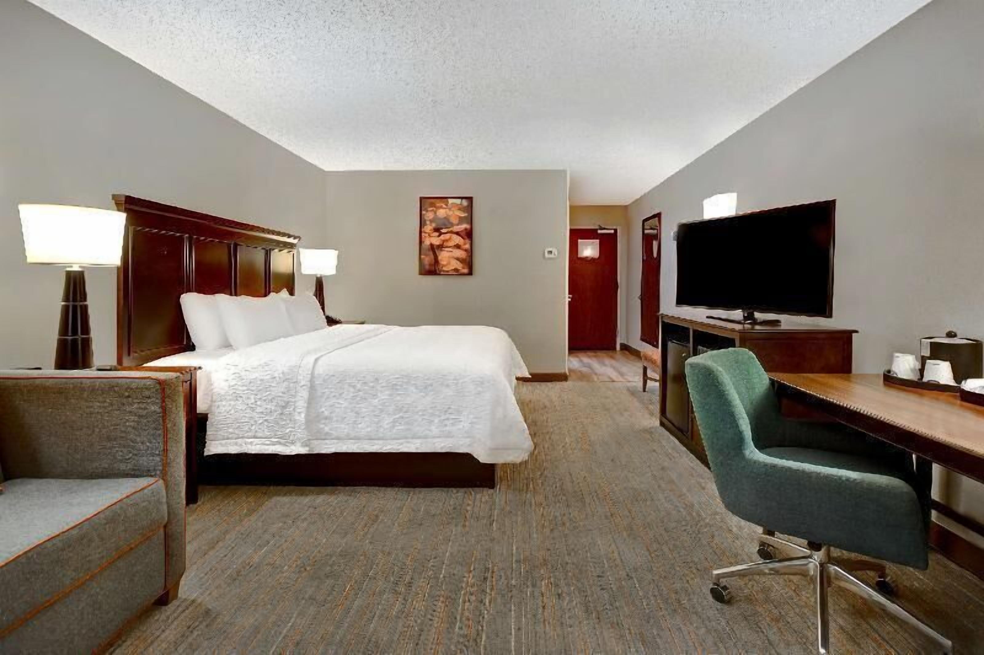 Premium bedding, down comforters, desk, laptop workspace