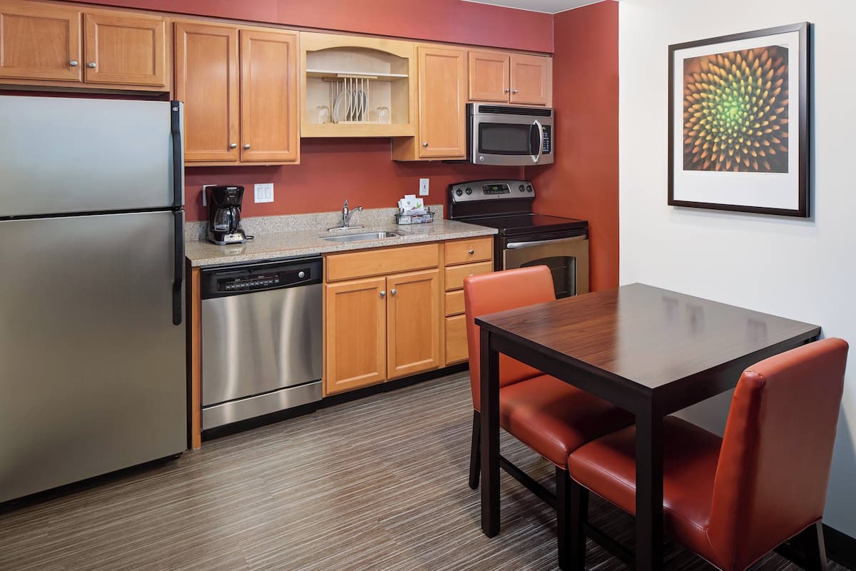 Fridge, microwave, stovetop, coffee/tea maker