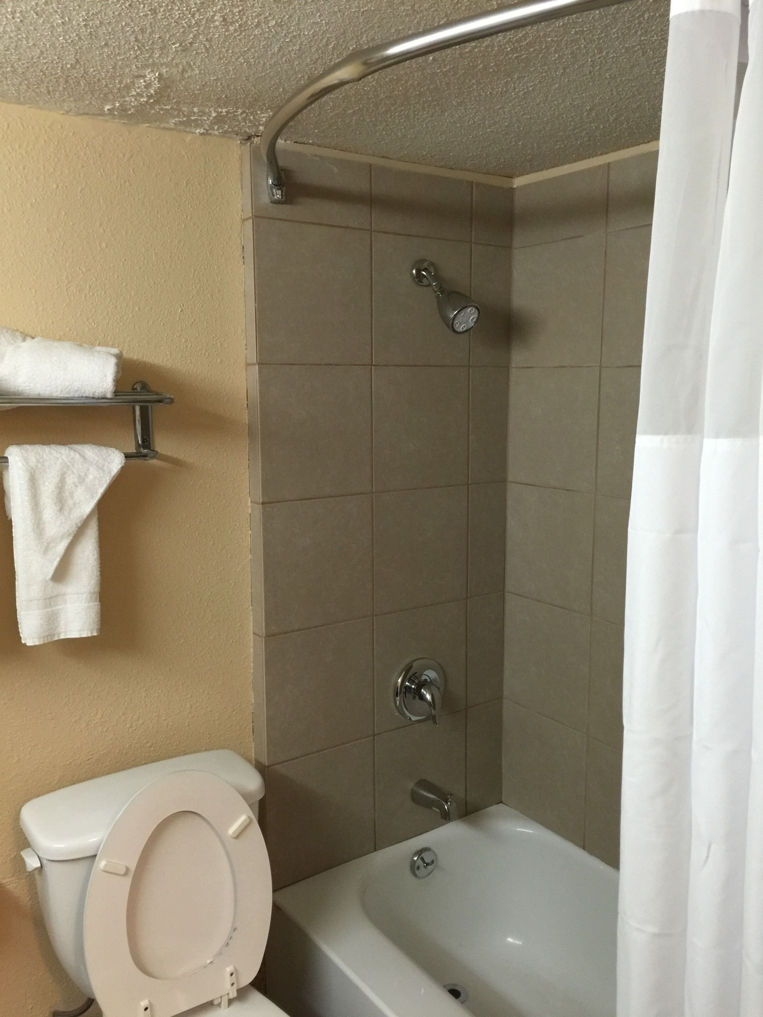 combined shower/bathtub, eco-friendly toiletries, hair dryer, towels