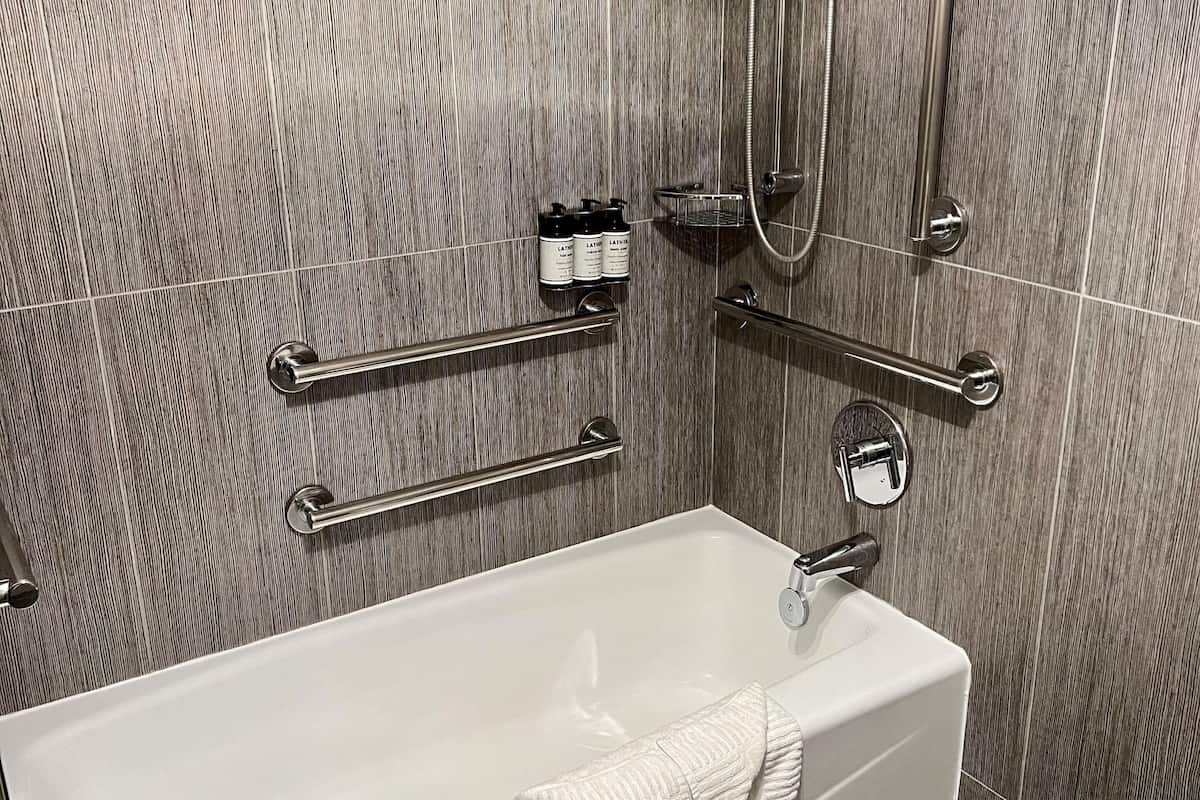 combined shower/bathtub, eco-friendly toiletries, hair dryer, towels