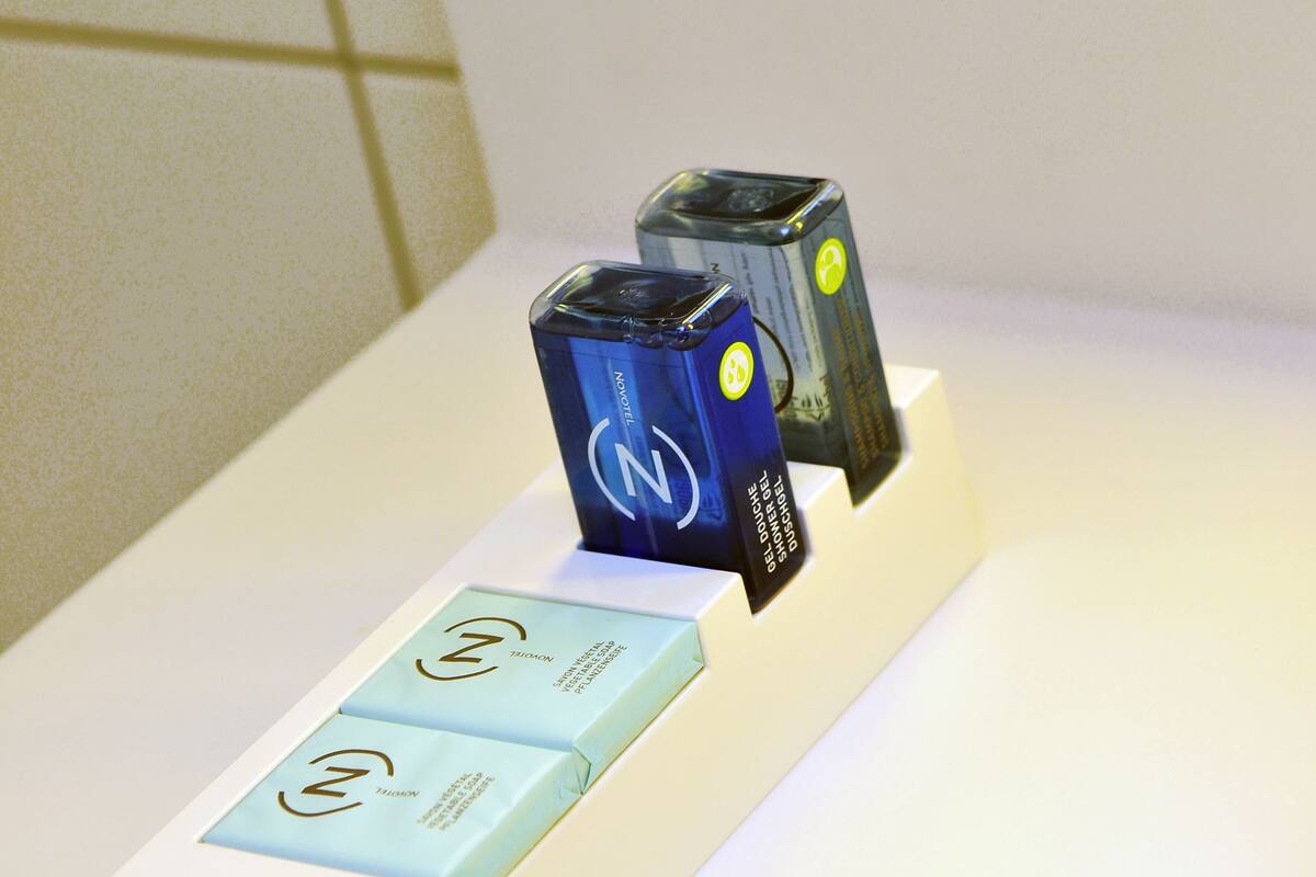 eco-friendly toiletries, hair dryer, towels, soap