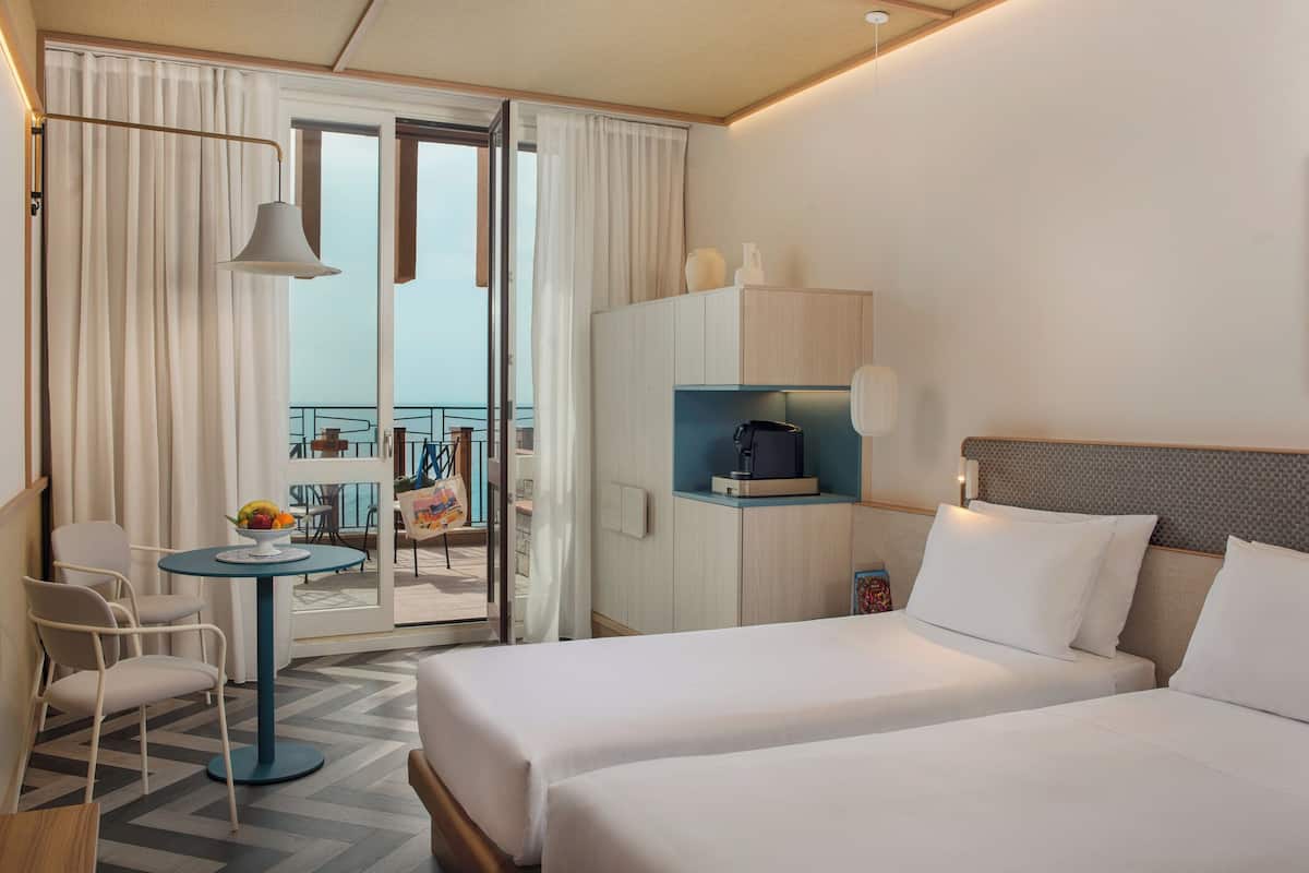 Premium Twin Room (View) | 1 bedroom, premium bedding, down comforters, minibar