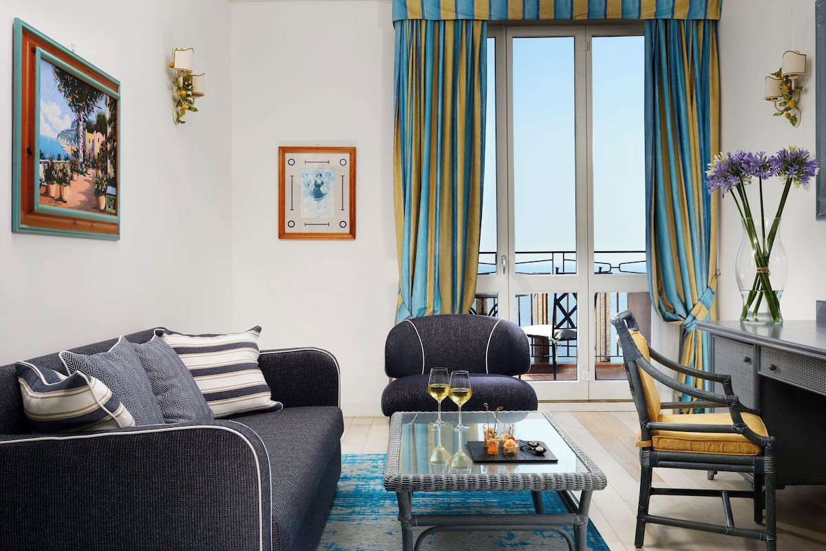 Junior Suite, Multiple Beds (with Rollaway Bed with View) | Living area | 32-inch LCD TV with satellite channels, TV