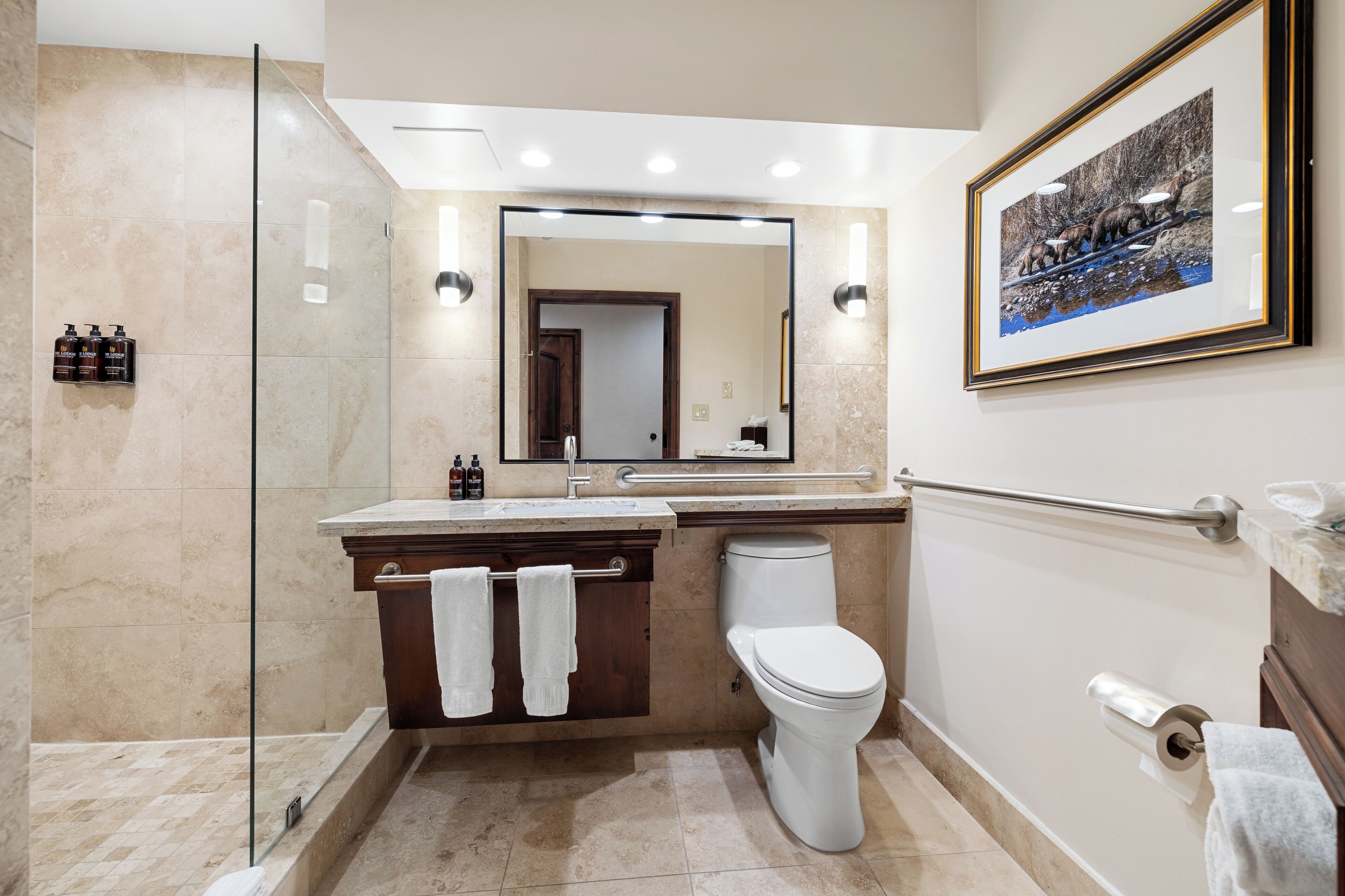 combined shower/bathtub, rainfall showerhead, designer toiletries