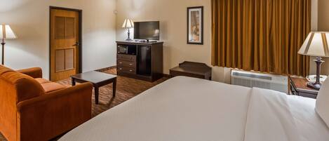 Suite, 1 King Bed, Non Smoking, Jetted Tub (with Sofabed) | Pillowtop beds, in-room safe, desk, laptop workspace