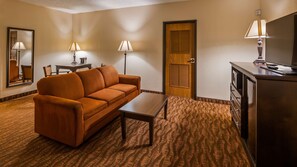 Suite, 1 King Bed, Non Smoking, Jetted Tub (with Sofabed) | Pillowtop beds, in-room safe, desk, laptop workspace