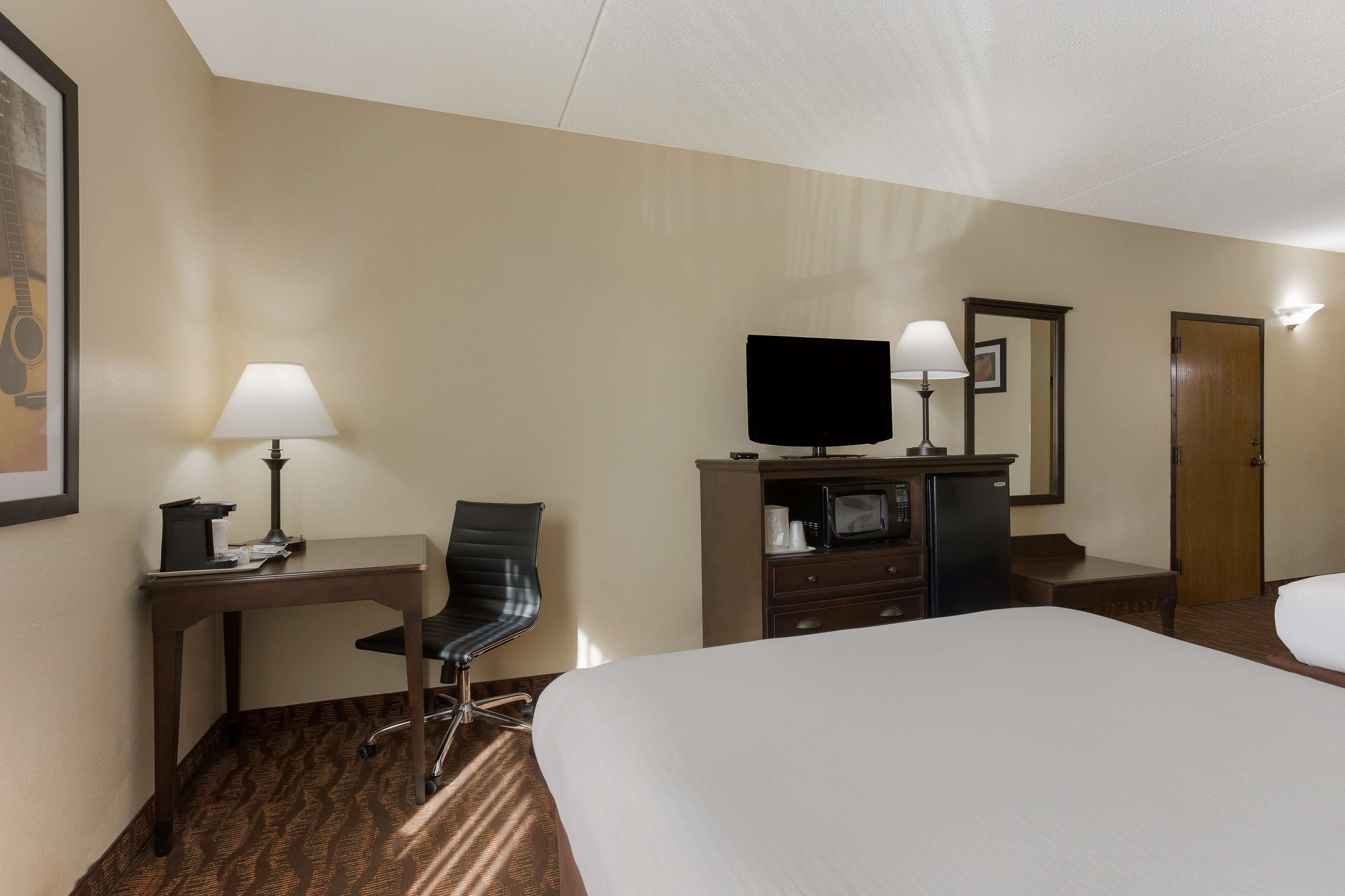 Premium bedding, pillowtop beds, desk, laptop workspace