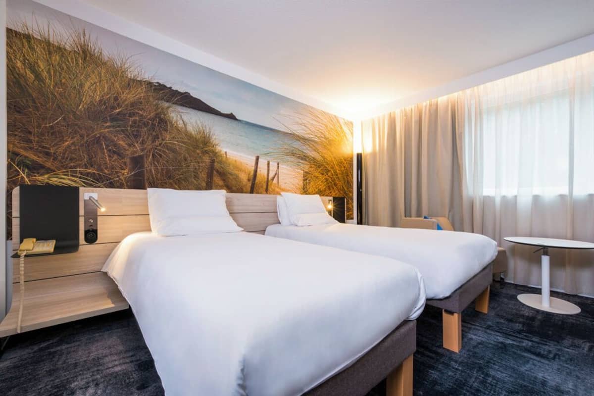 Chambre Classique, 2 lits une place | Literie de qualité supérieure, minibar, coffres-forts dans les chambres