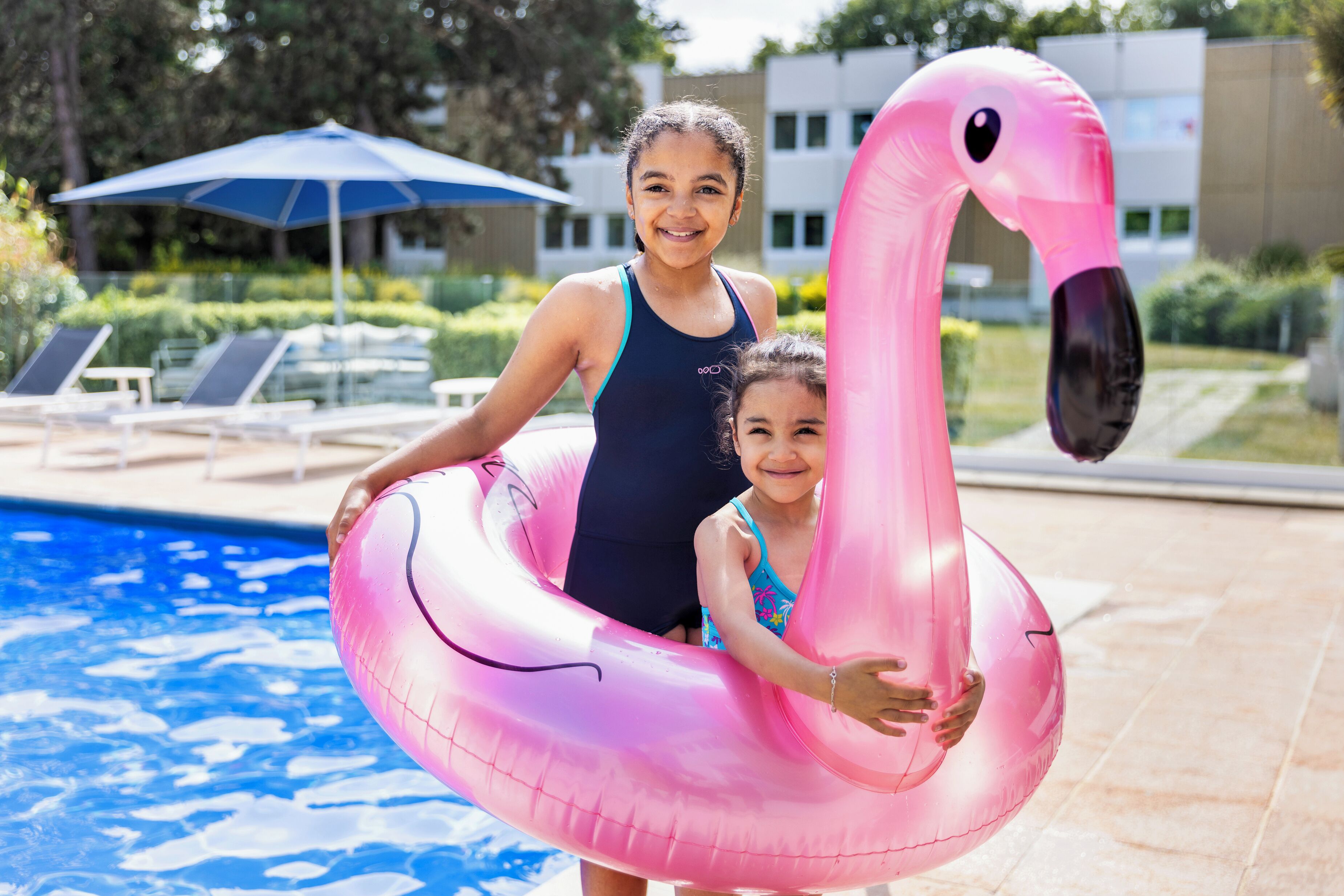 Seasonal outdoor pool, open 9:00 AM to 9:00 PM, pool loungers