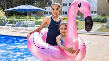 Seasonal outdoor pool, open 9:00 AM to 9:00 PM, pool loungers