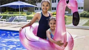 Seasonal outdoor pool, open 9:00 AM to 9:00 PM, sun loungers
