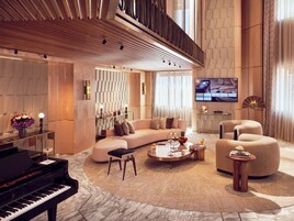 Prestige Duplex | Living area | 65-inch flat-screen TV with satellite channels, TV, Netflix