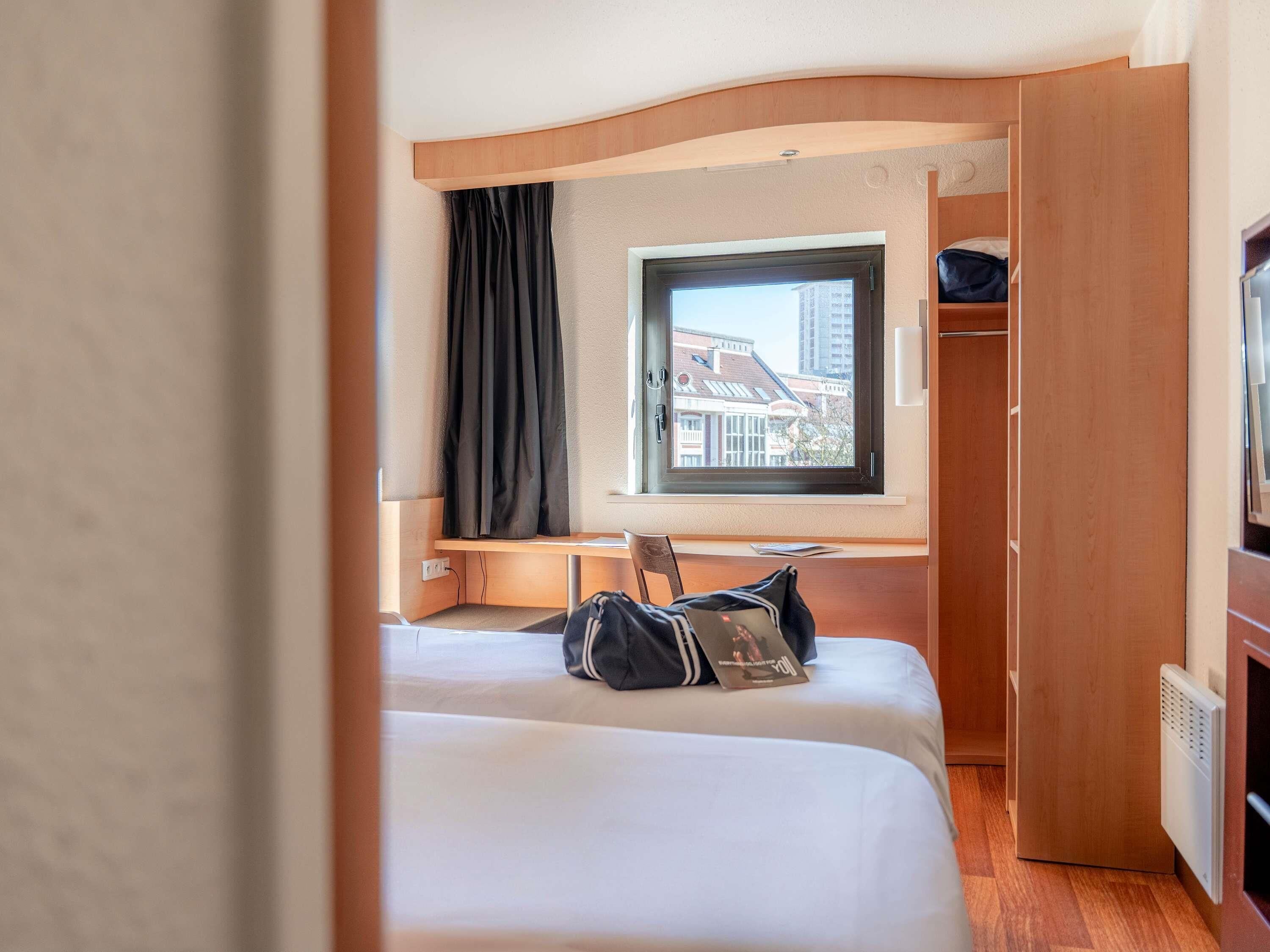 Desk, blackout curtains, soundproofing, iron/ironing board