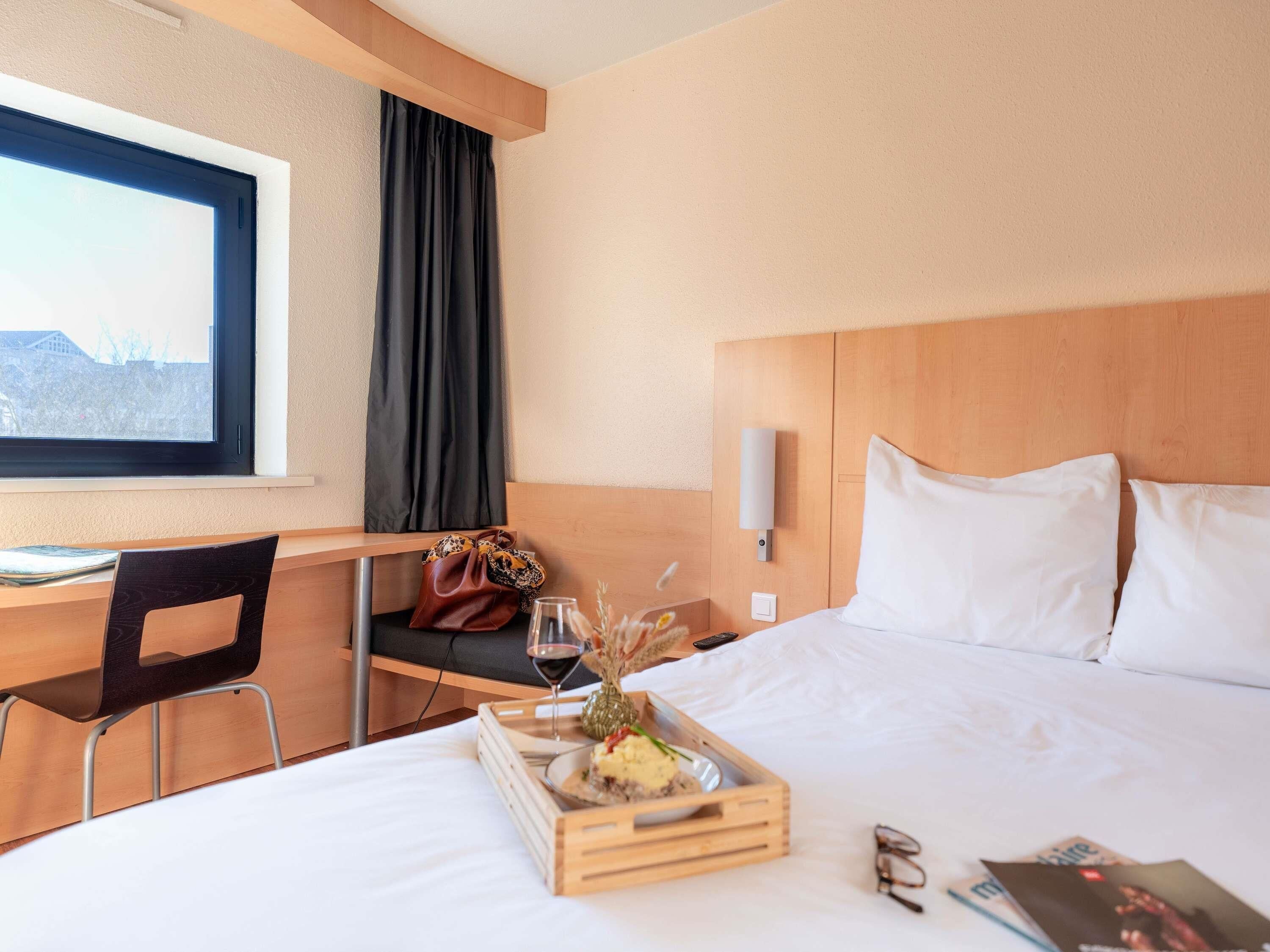 Desk, blackout drapes, soundproofing, iron/ironing board