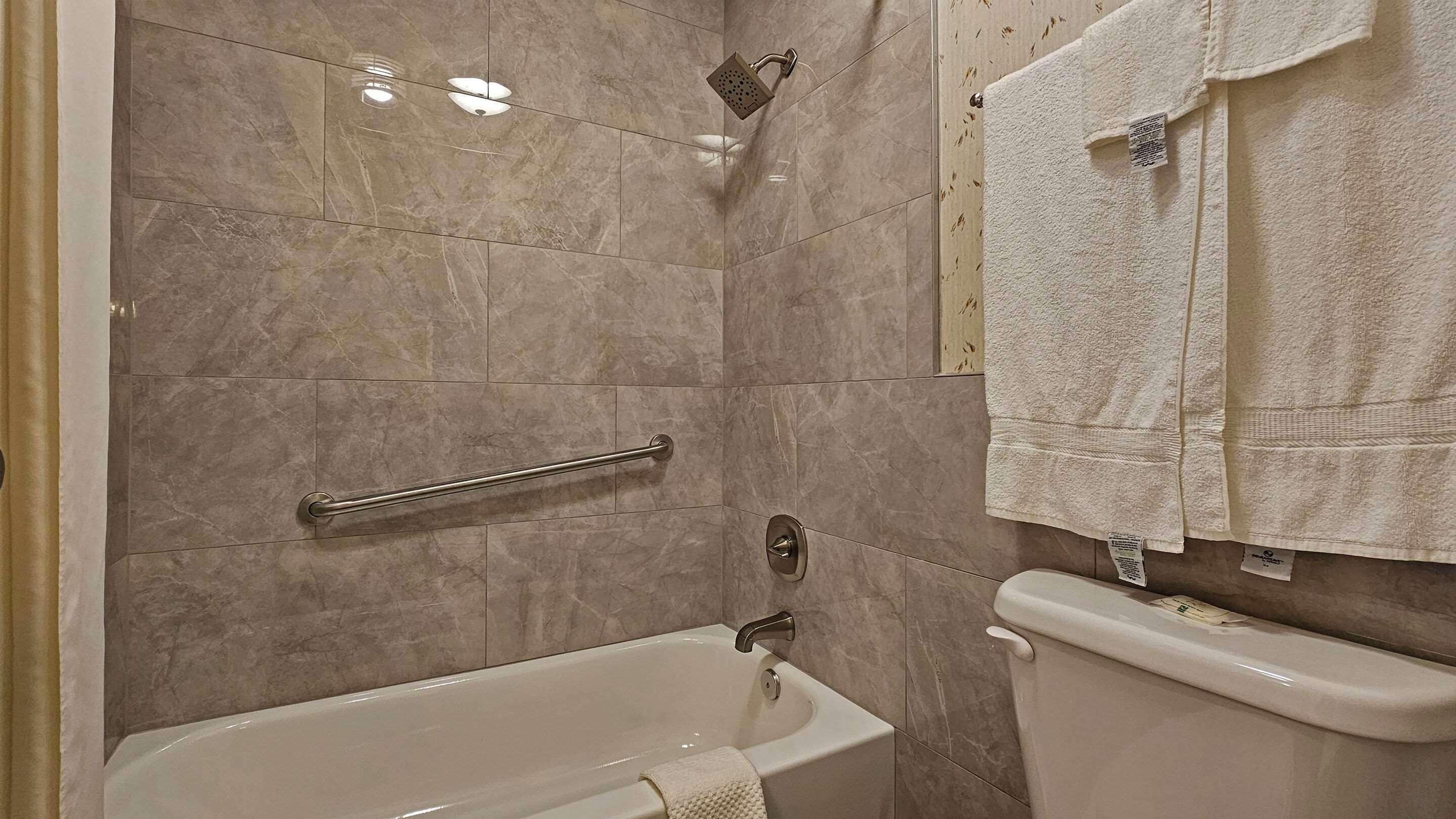 premium bedding, pillow-top beds, desk, blackout curtains