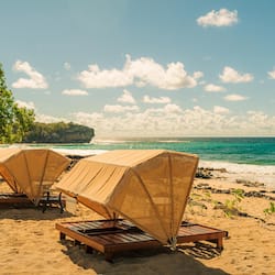 On the beach, white sand, beach towels