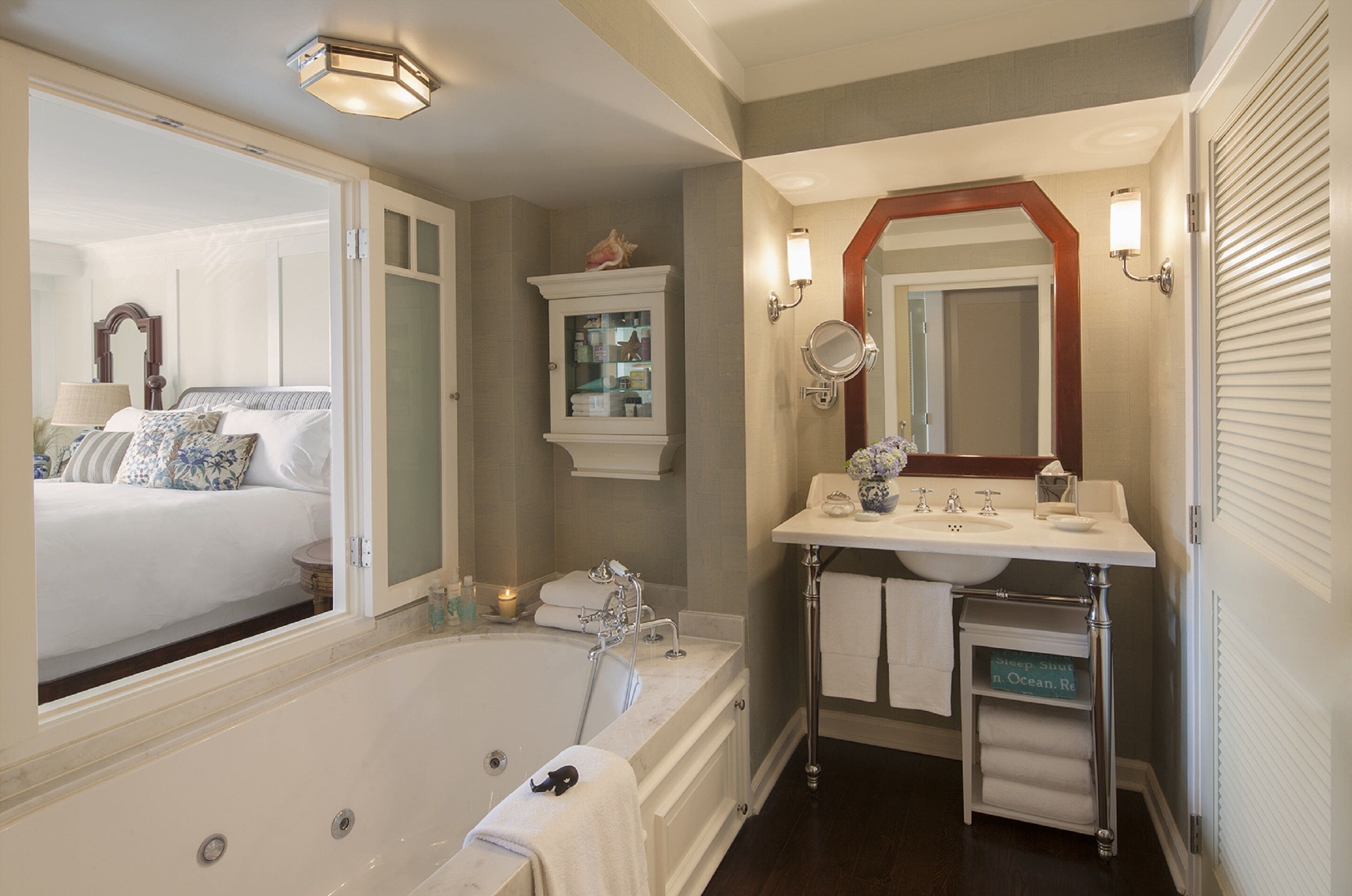 combined shower/bathtub, designer toiletries, hair dryer, bathrobes