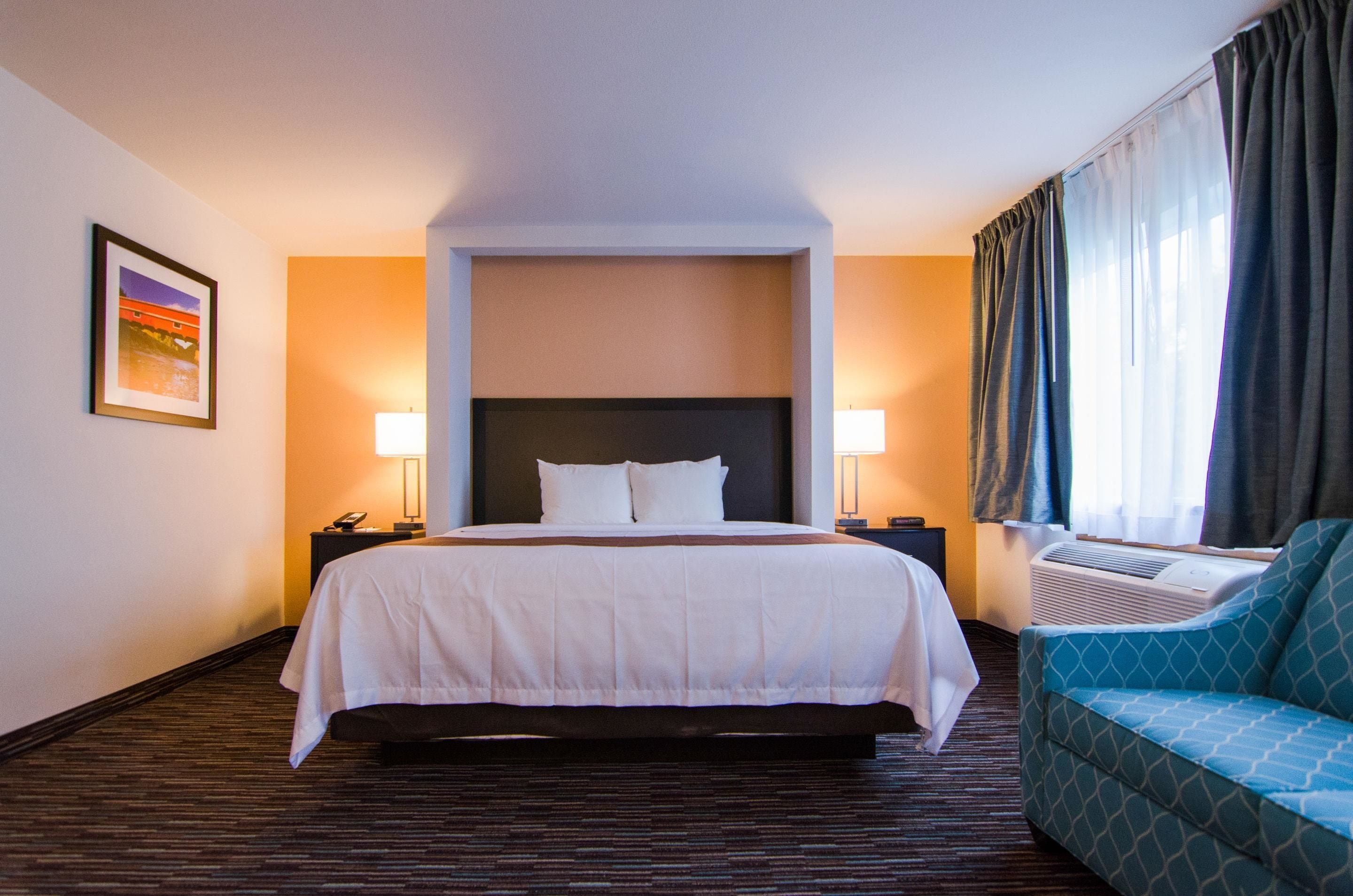 Habitación superior, 1 cama King size | Ropa de cama de alta calidad y escritorio 