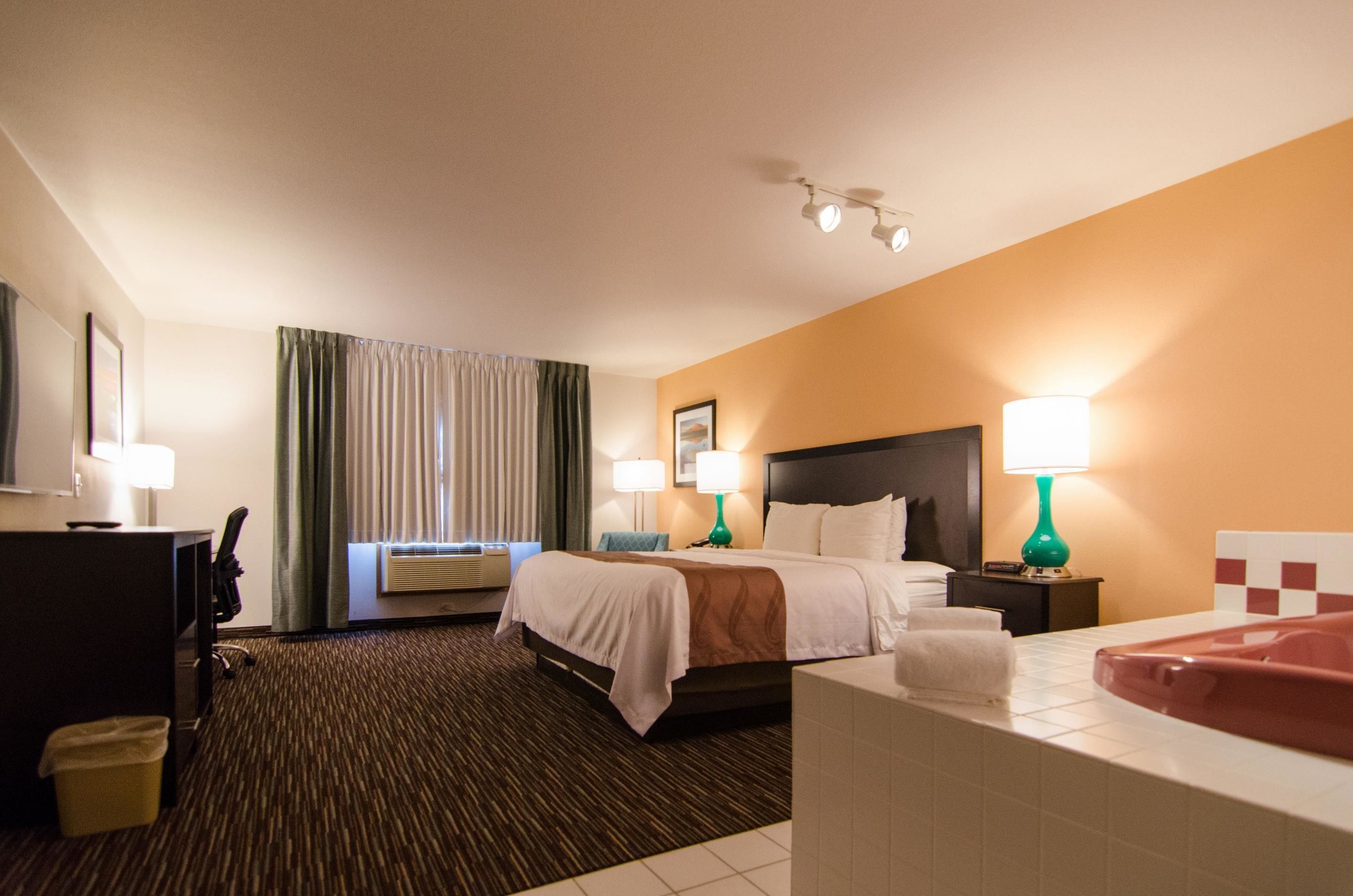 suite, 1 king bed, non smoking | premium bedding, desk, iron/ironing board, free wifi