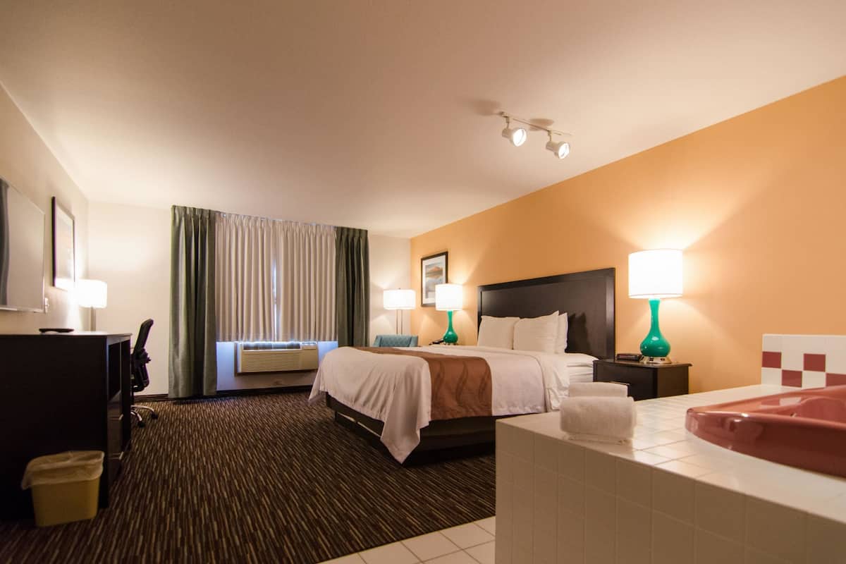 suite, 1 king bed, non smoking | premium bedding, desk, iron/ironing board, free wifi