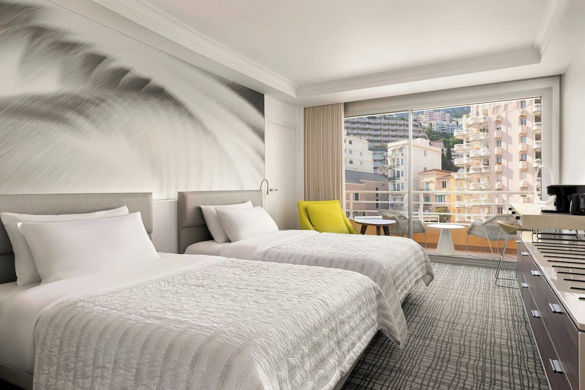 Premium bedding, pillow-top beds, minibar, in-room safe