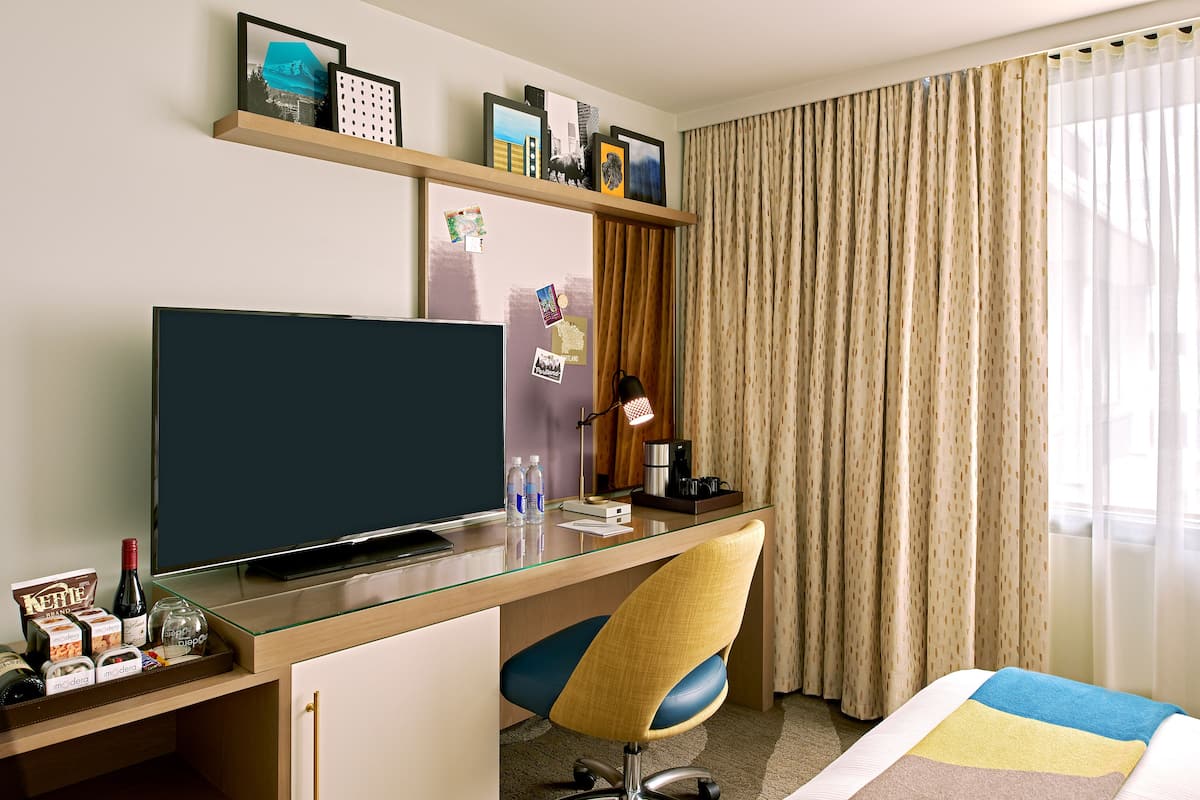 Premium bedding, down comforters, pillowtop beds, in-room safe