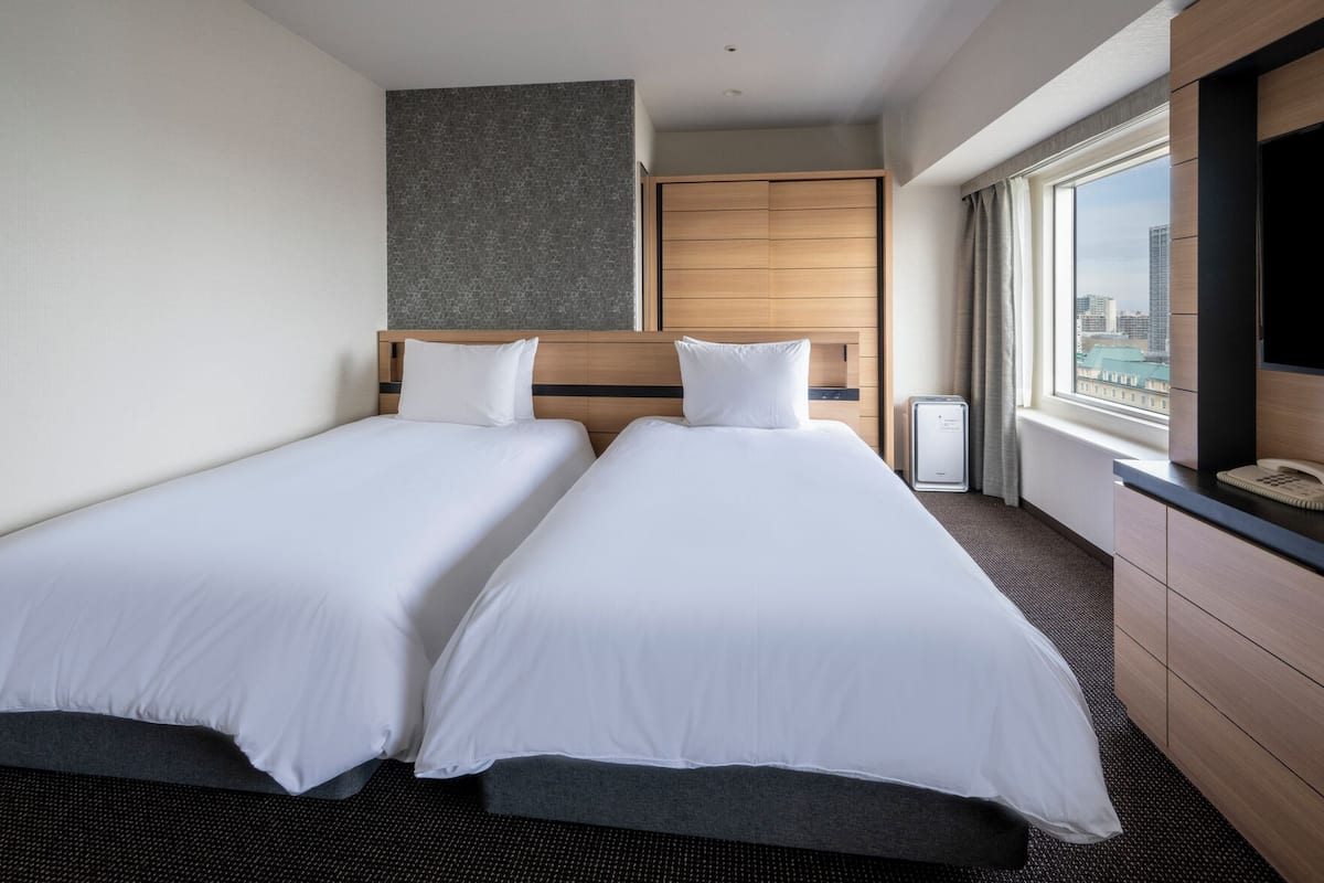 Standard Room, Multiple Beds (Mid Floor) | Minibar, desk, laptop workspace, WiFi (free)