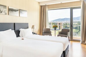 Ropa de cama de alta calidad y minibar 