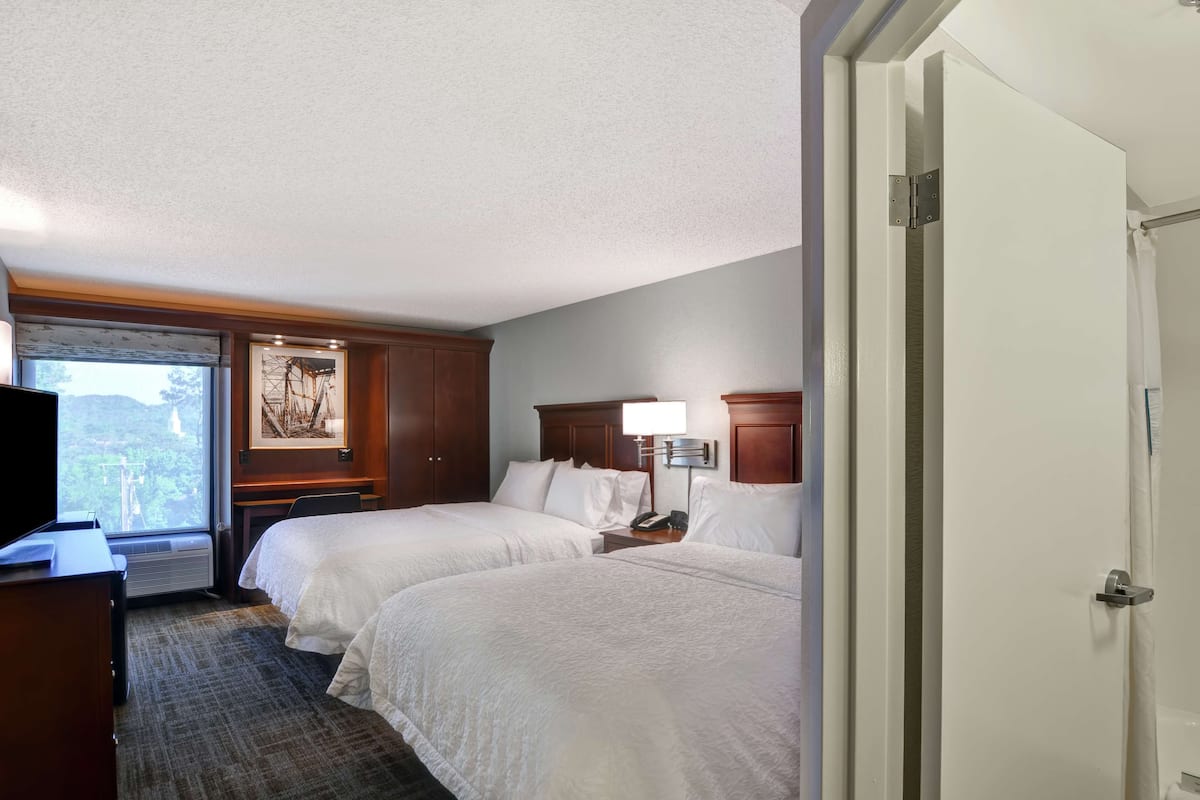 Room, 2 Queen Beds, Non Smoking | In-room safe, iron/ironing board, free cribs/infant beds, free WiFi