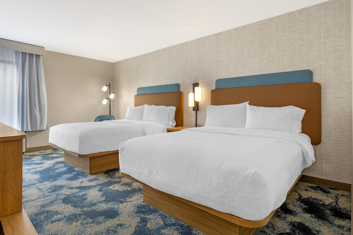 Down comforters, pillowtop beds, blackout drapes, iron/ironing board