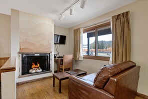 32-inch flat-screen TV with cable channels, TV, DVD player